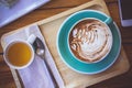 coffee mocha lattee cup on wood table and cake relax time on cafe shop Royalty Free Stock Photo