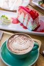 coffee mocha lattee cup on wood table and cake relax time on cafe shop Royalty Free Stock Photo