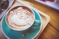 coffee mocha lattee cup on wood table and cake relax time on cafe shop Royalty Free Stock Photo