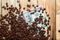 Coffee and money on a wooden table. Earnings on coffee.