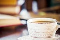 Coffee morning in the workplace. with a book or laptop. selective focus. Royalty Free Stock Photo