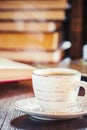 Coffee morning in the workplace. with a book or laptop. selective focus. Royalty Free Stock Photo