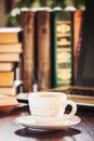 Coffee morning in the workplace. with a book or laptop. selective focus. Royalty Free Stock Photo