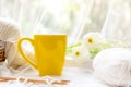 Coffee morning. Yellow steaming cup of hot coffee for relax after working hobbies crochet Royalty Free Stock Photo