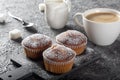 Coffee muffins on a wooden Board. Sweet muffins with berry filling on the table.