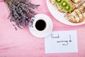 Coffee mug with bouquet of flowers lavender and notes good morning Royalty Free Stock Photo