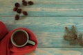 Coffee mug, a warm scarf, a branch of pine and cones Royalty Free Stock Photo