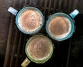 Coffee mugs on cane table