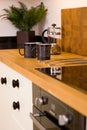 Coffee mugs in modern designer kitchen