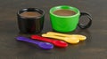 Coffee, mugs, spoons, table, drink, studio, colorful, background Royalty Free Stock Photo