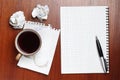 Coffee, notebook, pen and crumpled paper Royalty Free Stock Photo