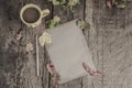 Coffee and notebook on wooden table decorated with autumn leaves Royalty Free Stock Photo