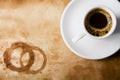 Coffee on old paper with round coffee stains Royalty Free Stock Photo