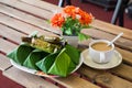 Coffee and palm leaf wrapped sweet Thai dessert