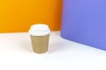 Coffee paper cup with colorful background.