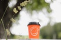 Coffee paper cup with a have a nice day message. Good morning, motivation concept Royalty Free Stock Photo