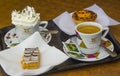 Coffee and pastries for two served in a local cafe in Albuferia in Portugal Royalty Free Stock Photo