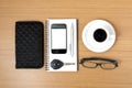 Coffee and phone with notepad,car key,eyeglasses and wallet Royalty Free Stock Photo