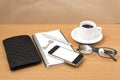 Coffee and phone with notepad,key,eyeglasses and wallet Royalty Free Stock Photo