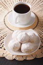 Coffee and polvoron cookies close-up on a plate. vertical Royalty Free Stock Photo