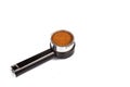 Coffee portafilter filled with finely grounded coffee in white background Royalty Free Stock Photo