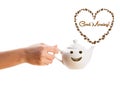 Coffee pot with coffee beans shaped heart with good morning sign Royalty Free Stock Photo