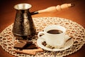 Coffee pot, cup of coffee, spices and chocolate. Vintage style Royalty Free Stock Photo