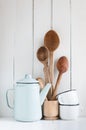 Coffee pot, enamel mugs and rustic spoons Royalty Free Stock Photo