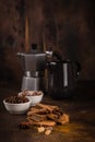 Coffee pot with spices on brown background Royalty Free Stock Photo