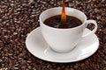 Coffee pouring into a cup Royalty Free Stock Photo