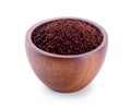 Coffee powder burst in bowl on white background Royalty Free Stock Photo