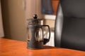 A coffee press for your pleasure at work Royalty Free Stock Photo