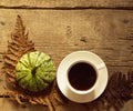 Coffee And Pumpkin On Wood Royalty Free Stock Photo