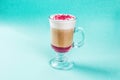 Coffee raff with raspberries in a glass cup with a handle Royalty Free Stock Photo