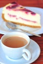 Coffee with raspberry cream cheesecake