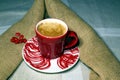 Coffee in a red colored ceramic coffee cup