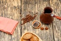 Coffee roasted beans are prepared for making a drink with dried slices of orange and lemon, anise stars. Rustic morning breakfast Royalty Free Stock Photo