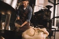 coffee roaster pouring coffee beans into Royalty Free Stock Photo