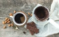 Coffee set: cezve (coffee pot) with freshly brewed coffee, a cof