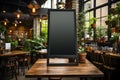 A coffee shop mockup with a blank black chalkboard menu Royalty Free Stock Photo