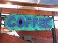 Coffee shop rustic metal blue and torquoise sign in small cafe in San Miguel de Allende mexico