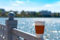 Coffee single cup on the fence