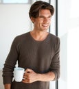 Coffee, smile and young man in apartment with thinking, vision or reflection face expression. Handsome, happy and male