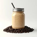 Coffee Smoothie in Glass Jar with Straw on Coffee Beans on White Royalty Free Stock Photo