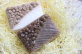 Coffee soap. Handmade soap. Coffee soap scrub isolated on a light background.coffee soap, soap for spa, coffee and milk.