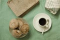 A coffee, some muffins and an old book with style flat lay Royalty Free Stock Photo