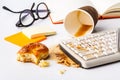 Coffee spilling on keyboard ib work place office Royalty Free Stock Photo