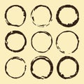 Coffee stain set. Brown ring blots isolated on beige background. Vector illustration Royalty Free Stock Photo