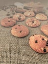 Coffee still life. Cookies for coffee. Coffee beans and fragrant cinnamon Royalty Free Stock Photo