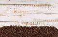 Coffee stripes beans on wood background